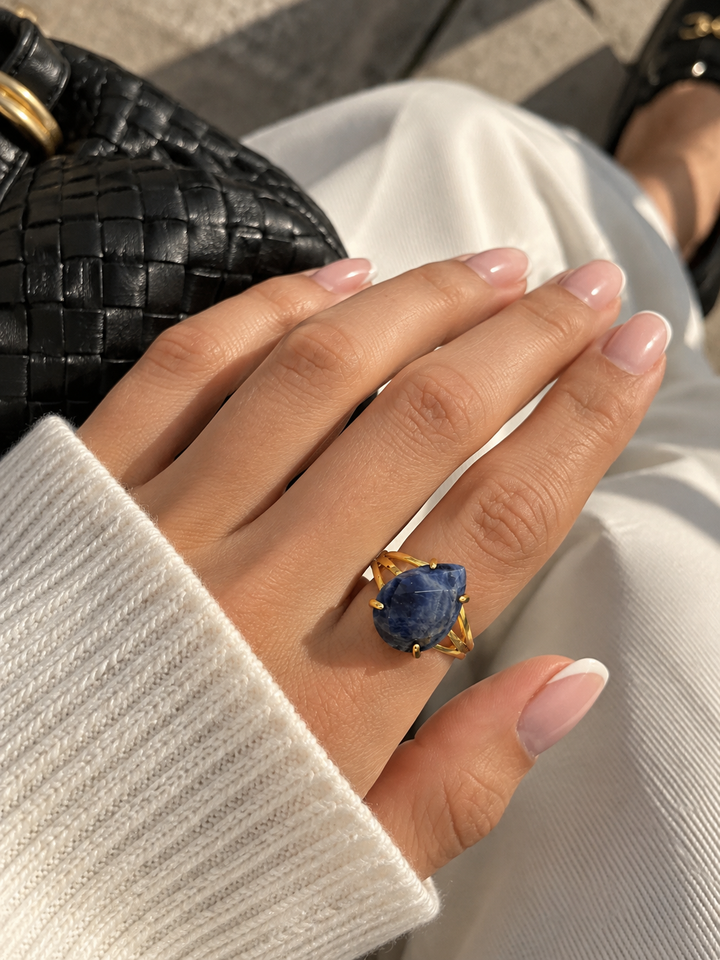 Ring with natural teardrop stones, various types