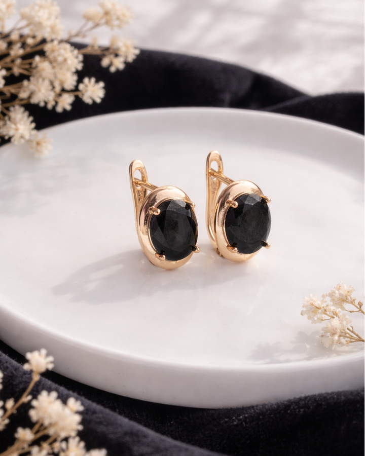 auskari ar melni kristālu