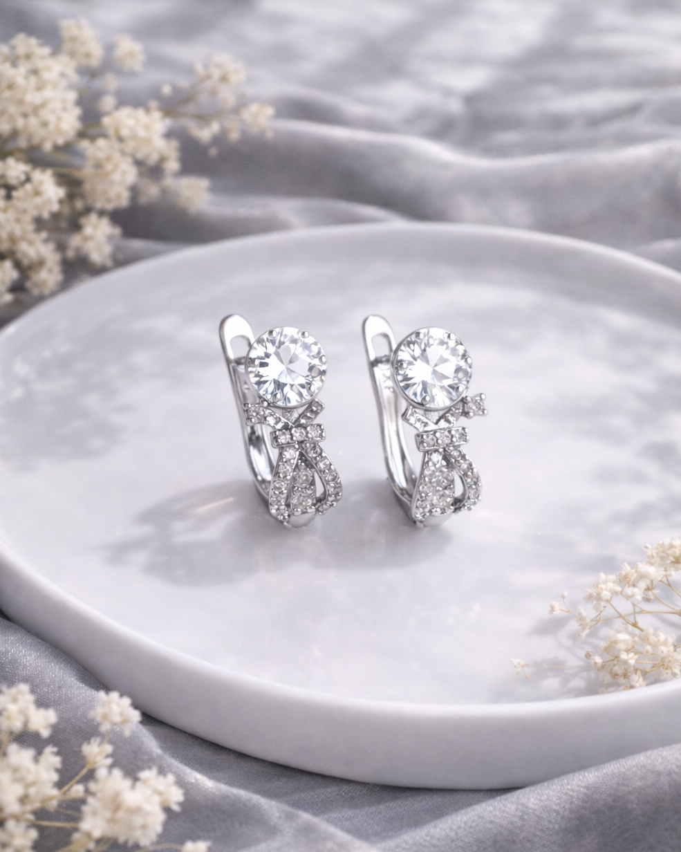 rodija auskari sudraba krāsā ar cirkoniju kristāliem