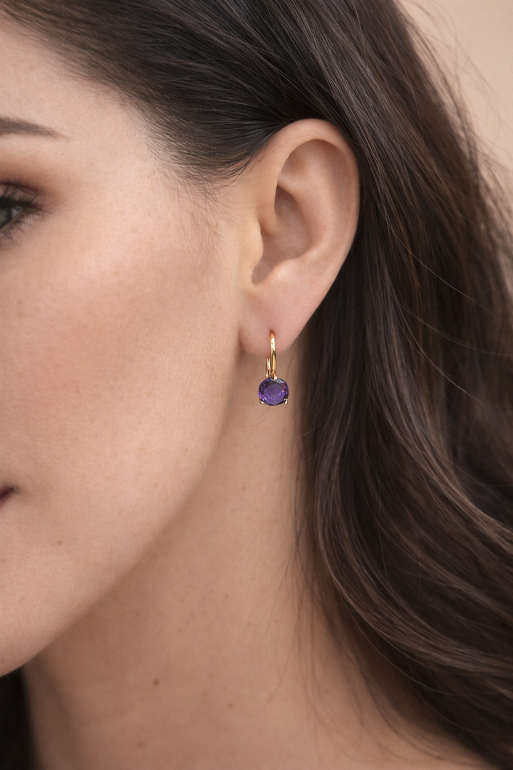 Rozā zelta auskari ar violetu akmeni