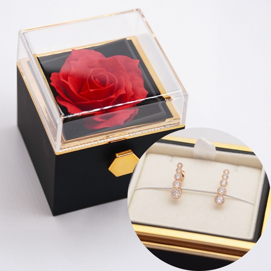 rotu kastīte ar mūžīgo rozi un auskariem