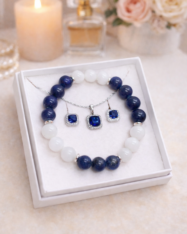 dabigā akmens rokassprādze un zils rotu komplekts