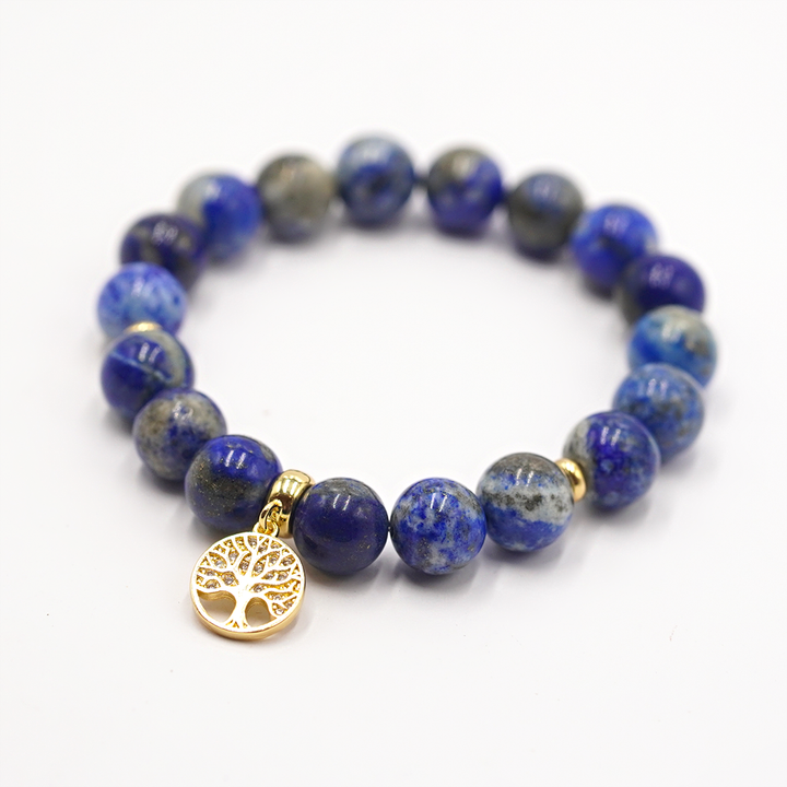 Lazurīta rokassprādze  ar zelta krāsas dzīvības koka piekariņu